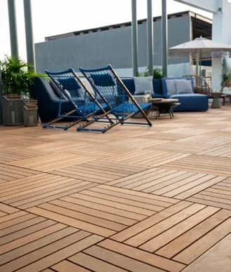 Alternating wood tile pattern on an outdoor terrace with lounge furniture