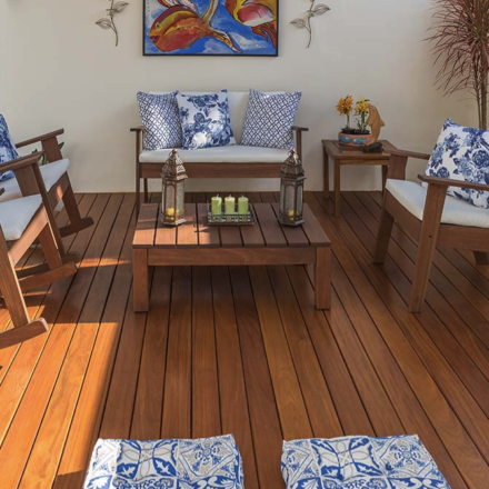 A small canopied Ipe deck with outdoor patio furniture