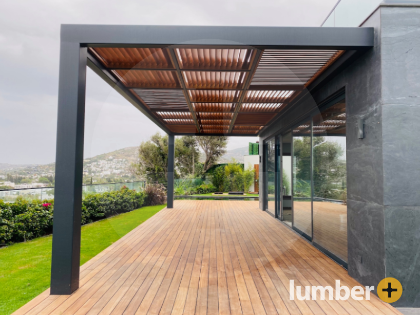 Caption: A fire-resistant deck underneath a modern wooden pergola.