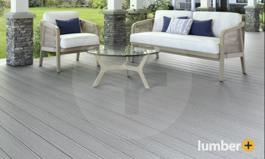 Light Gray Fiberon® decking material with patio deck furniture and a small glass table.