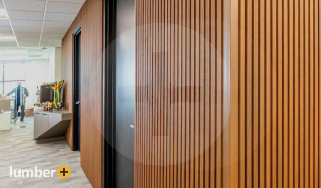 Wood cladding panels inside an office space. 
