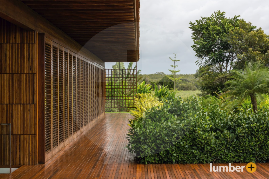 Hardwood cladding walkway and siding on a house