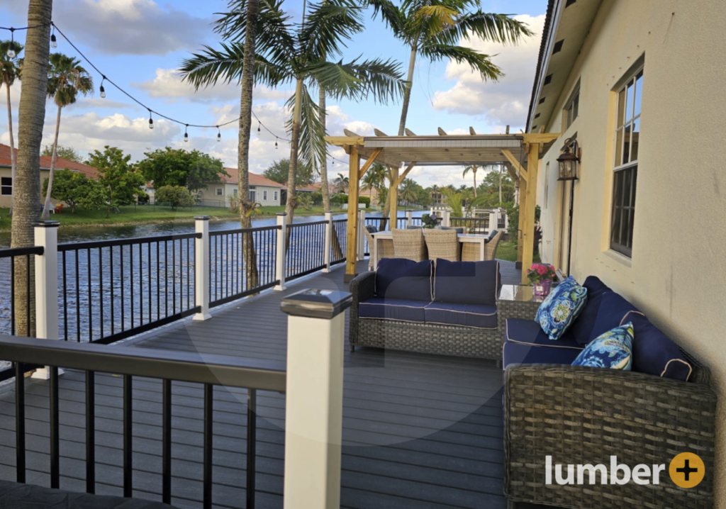 Dark grey composite deck in Miami overlooking a lake