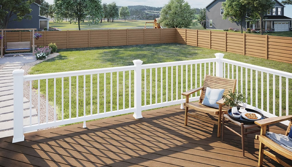 All-white Trex railing with white aluminum infill on a soft brown deck for a clean, contrasting design.