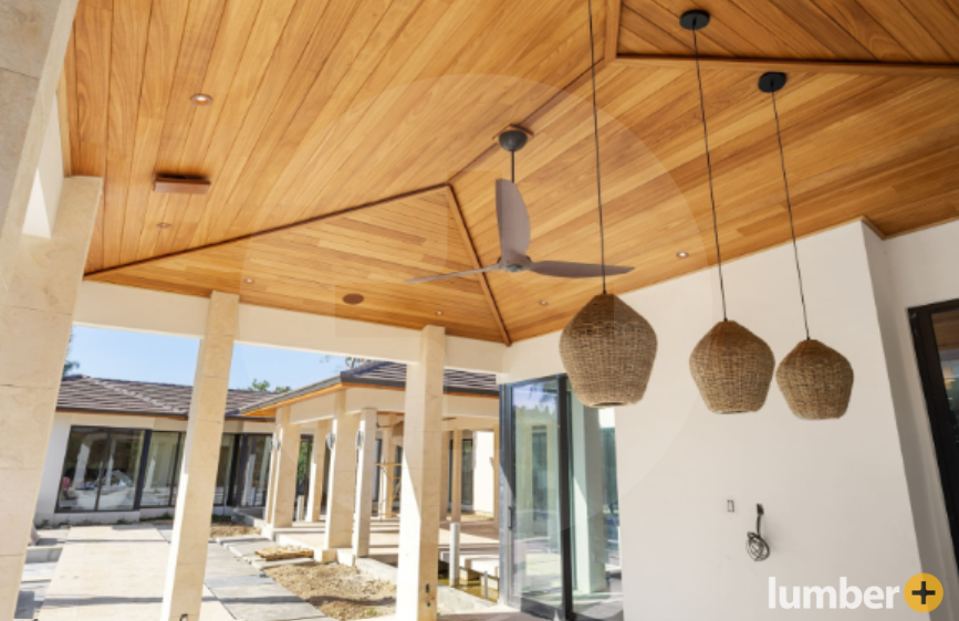 Thermowood enhances the ceiling of an outdoor porch with durability and natural warmth.