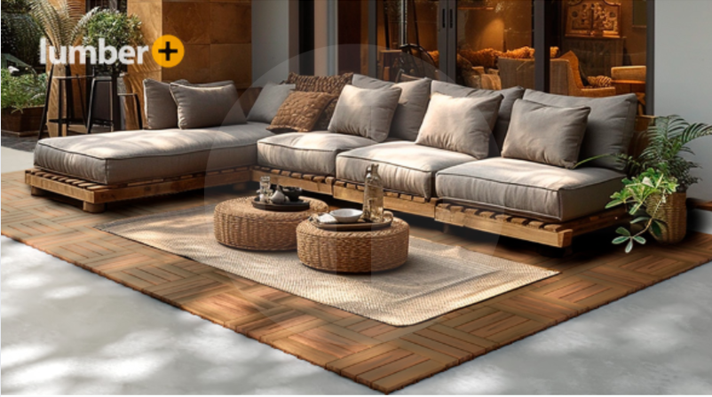 A cozy outdoor sofa pairs with woven tables atop wood deck tiles.