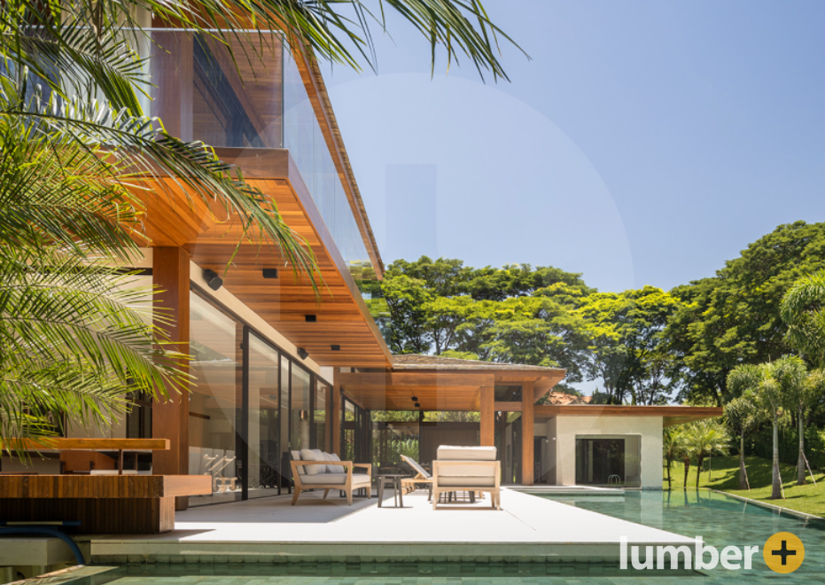 Beach house with wooden cladding elements highlighting architectural design styles.
