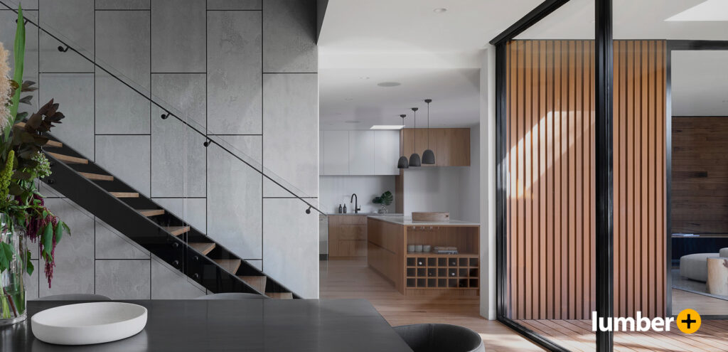 An image of a wooden slat wall partition that divides a room.