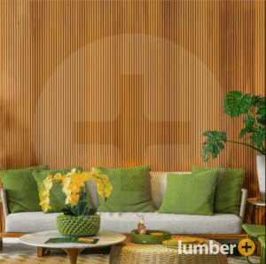 Wood paneling behind a sofa with green pillows.