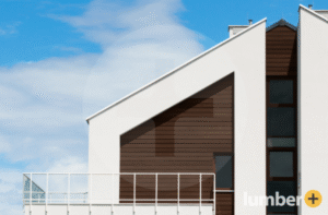 Modern home with wood-look composite siding and white stucco.