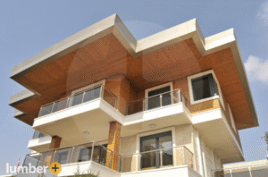 Thermowood Pine adds a bold touch to this sharp modern roofline.