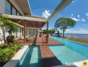 A stunning poolside view built with the best deck materials for full sun.