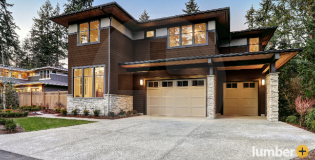 An image of a two-story house with dark brown composite siding.