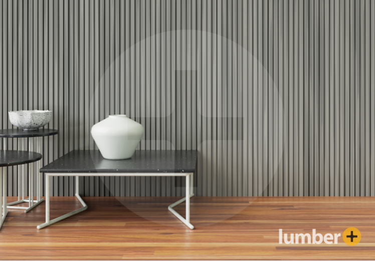 An image of a modern interior with gray vertical slat wall paneling and minimalist furniture.